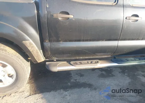 2009 Toyota Tacoma Base V6 из США, поврежденный, VIN 3TMLU42N69M036738